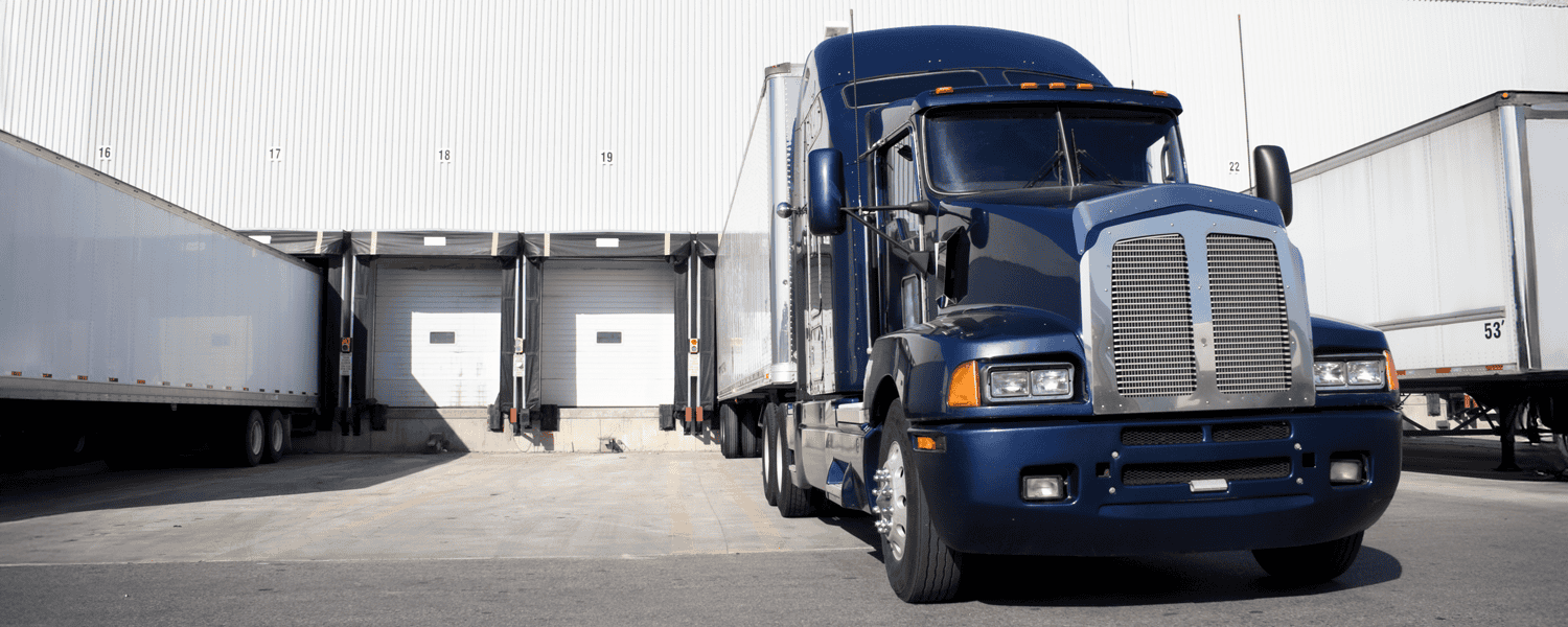 A truck at a loading dock.