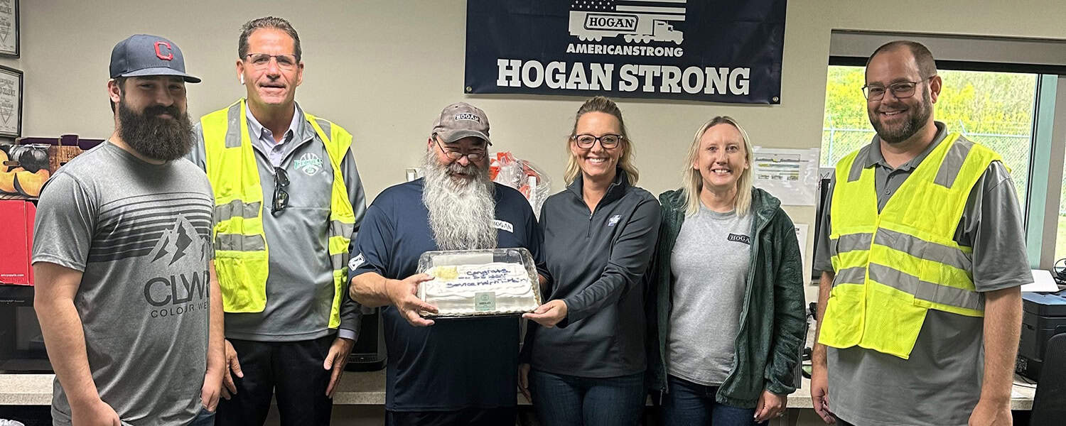 Team members celebrating a birthday at Hogan.