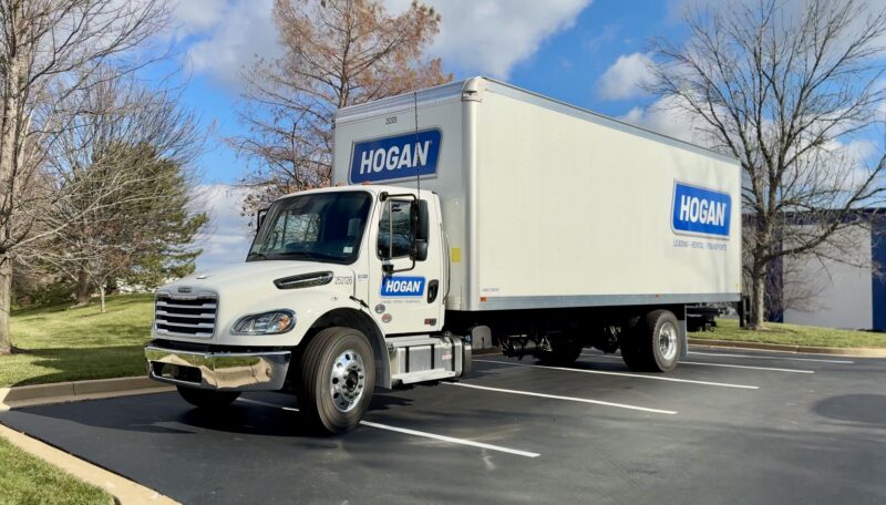 hogan truck in parking lot with new logo